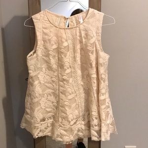 White sleeveless top